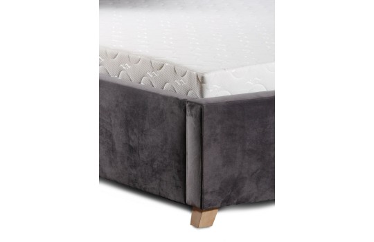 Łóżko tapicerowane z miłą tkaniną Como
