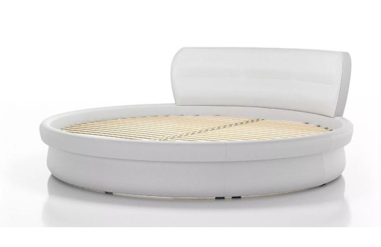 białe okrągłe łóżko 