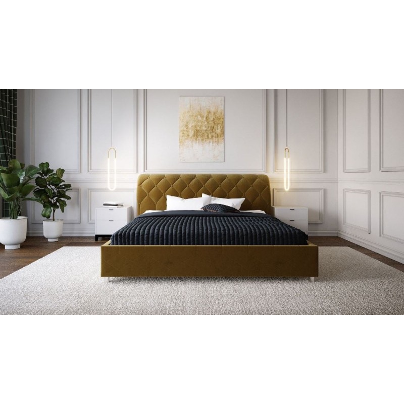 łóżko z zawiniętym zagłówkiem