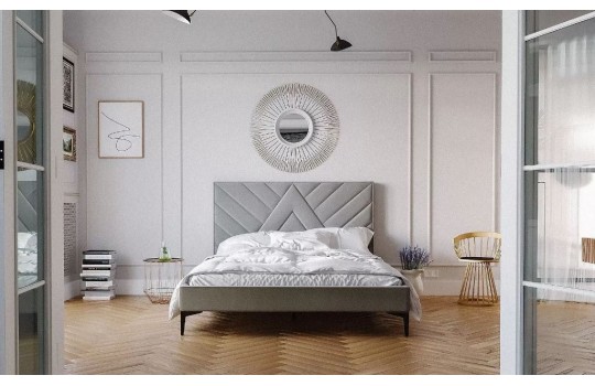 Łóżko szare na wysokich nóżkach 