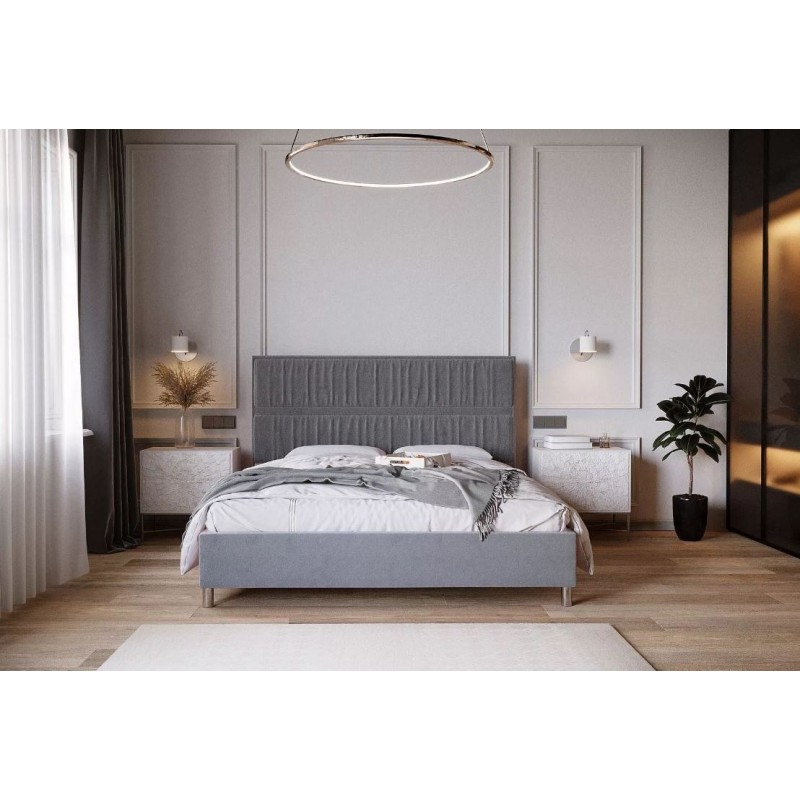 Przytulne łóżko tapicerowane 