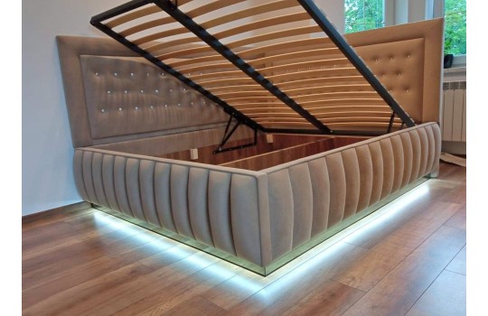 Narożne łóżko tapicerowane z pojemnikiem Odys 