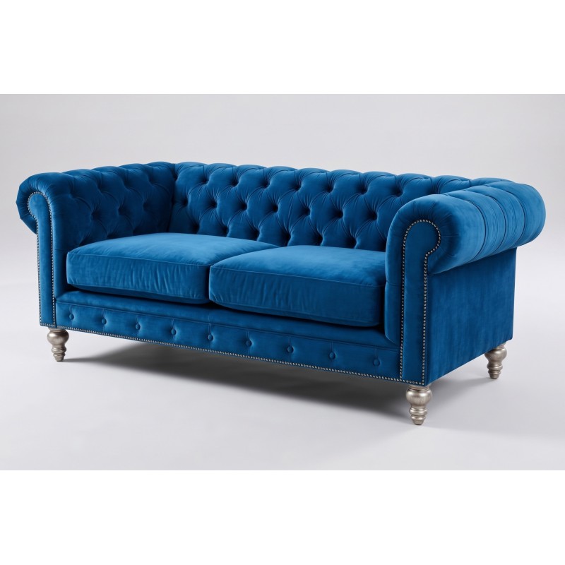 Kobaltowa sofa chesterfield Arbela 235 cm z zestawu, z ćwiekami na podłokietnikach Kobaltowa sofa chesterfield Arbela 235 cm z zestawu, z ćwiekami na podłokietnikach