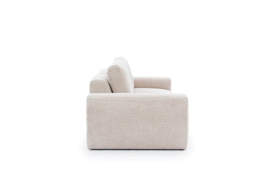 sofa w beżowym obiciu 
