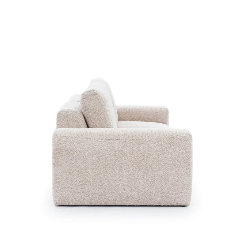 sofa w beżowym obiciu 