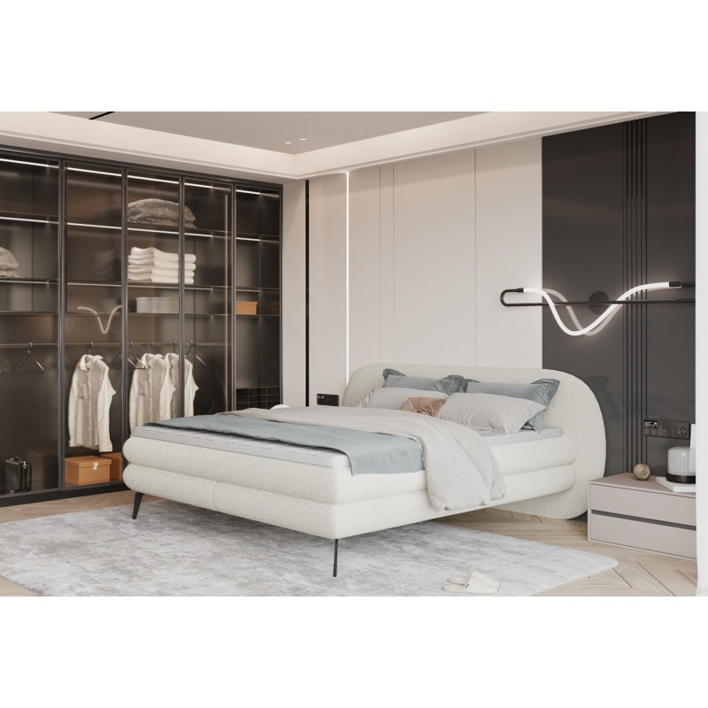 łóżko w jasnym materiale luka