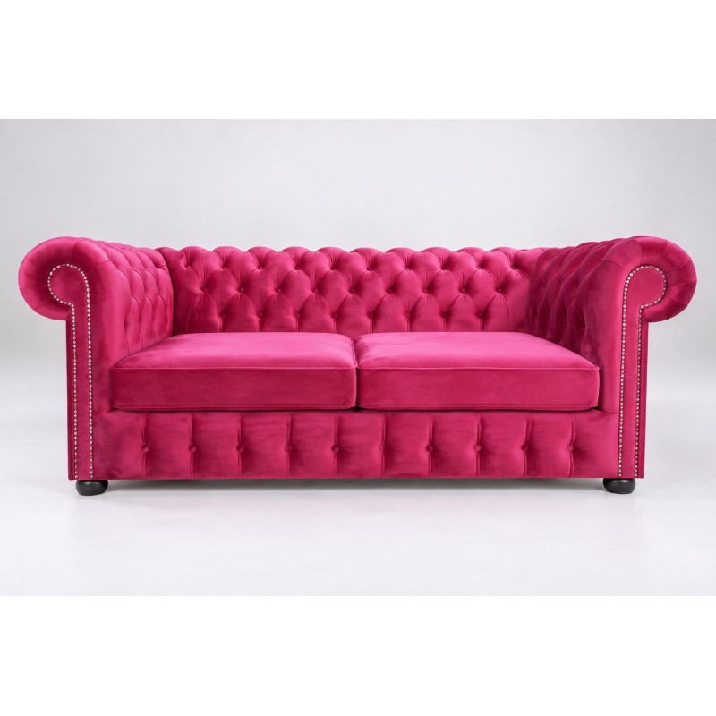 Różowa welurowa sofa chesterfield Parole z pełnym pikowaniem Różowa welurowa sofa chesterfield Parole z pełnym pikowaniem