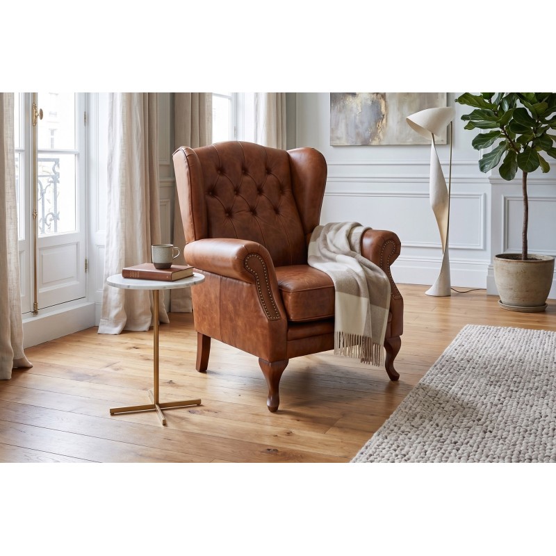 Fotel uszak ze skóry naturalnej Bertiso w aranżacji eleganckiego salonu Fotel uszak ze skóry naturalnej Bertiso w aranżacji eleganckiego salonu
