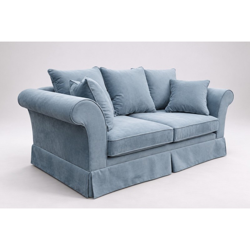 Jasnoniebieska sofa rozkładana Bufalo 200 cm z falbaną na białym tle