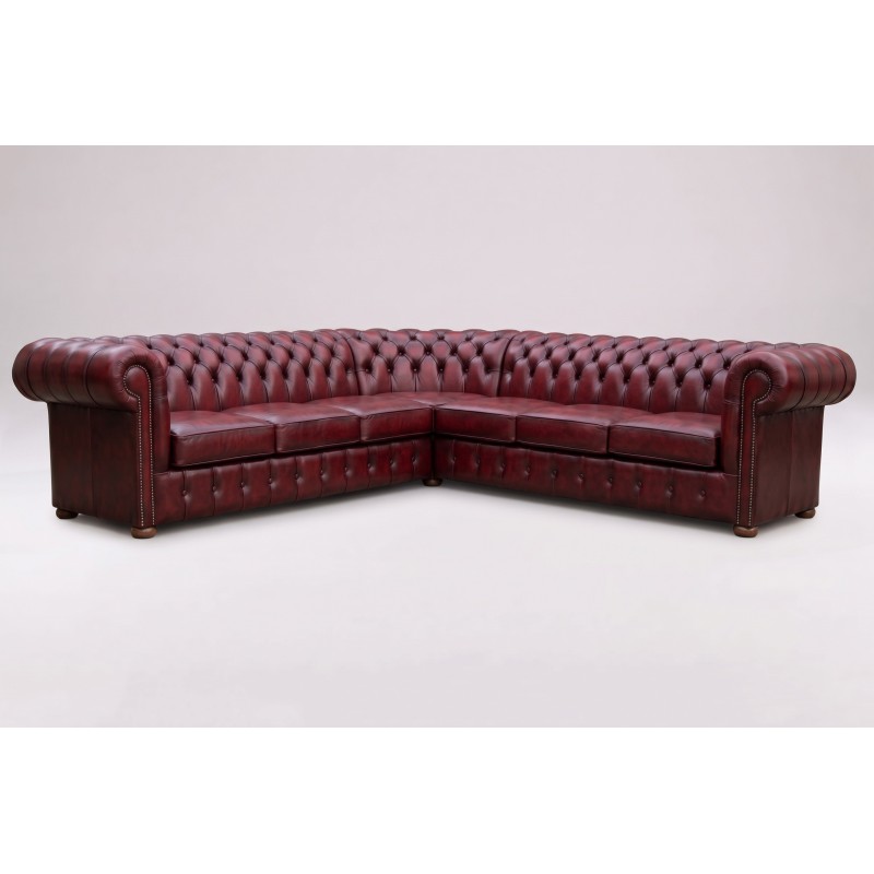Pikowana kanapa narożna chesterfield Noble 280 x 240 cm w bordowej skórze Pikowana kanapa narożna chesterfield Noble 280 x 240 cm w bordowej skórze