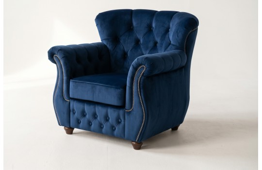 Fotel chesterfield z wysokim oparciem James 95 cm w granatowym welurze z pikowaniem na guzikach