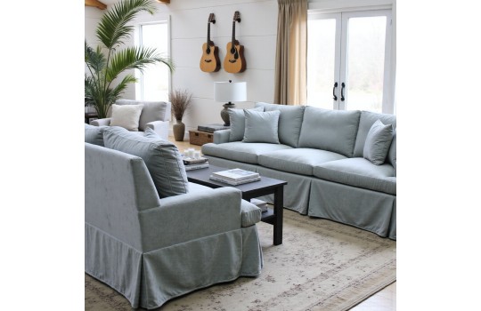 sofy w szarym materiale 