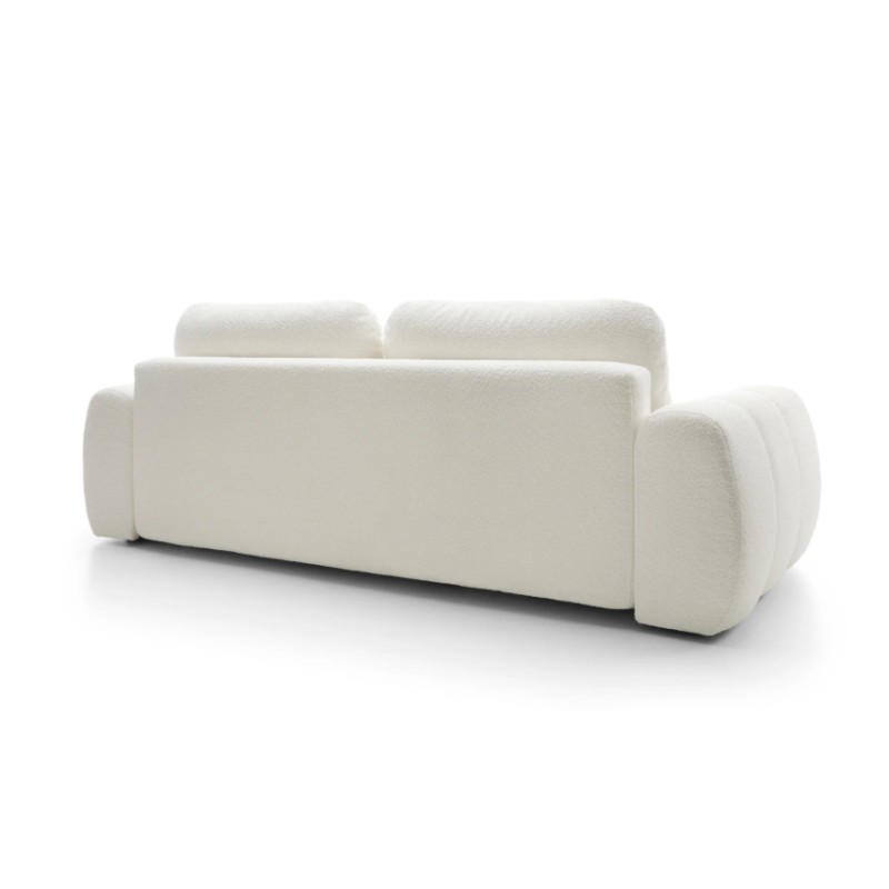 sofa w kremowym materiale 