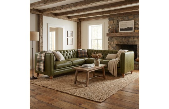 duży narożnik w zielonej skórze 