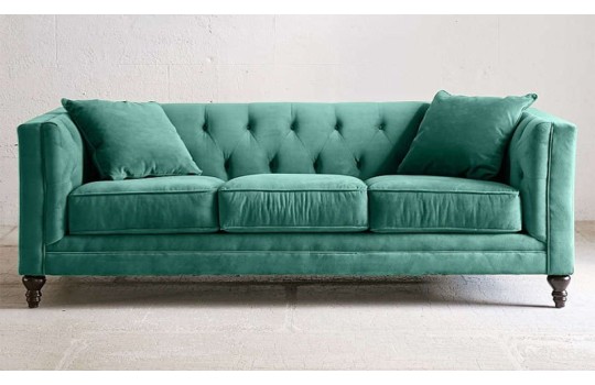 sofa w welurowej tkaninie 