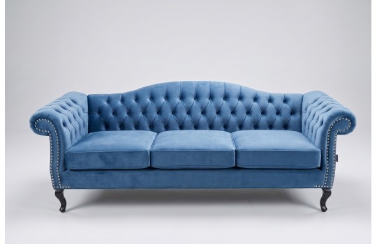 Błękitna sofa chesterfield Solano 210 cm z pikowaniem na gładkim tle