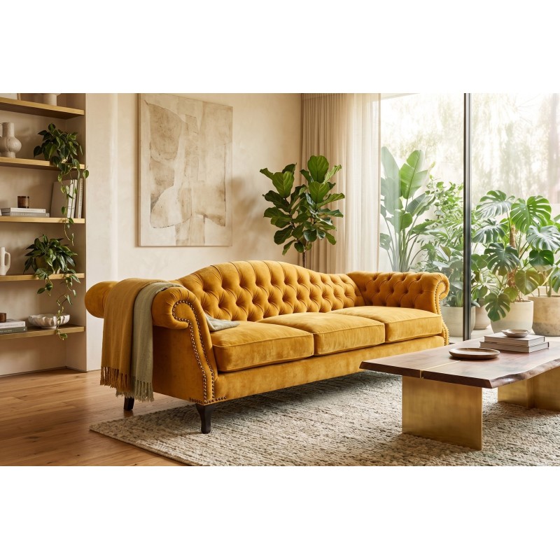 Musztardowa sofa chesterfield Solano w nowoczesnym pokoju dziennym ze stolikiem kawowym