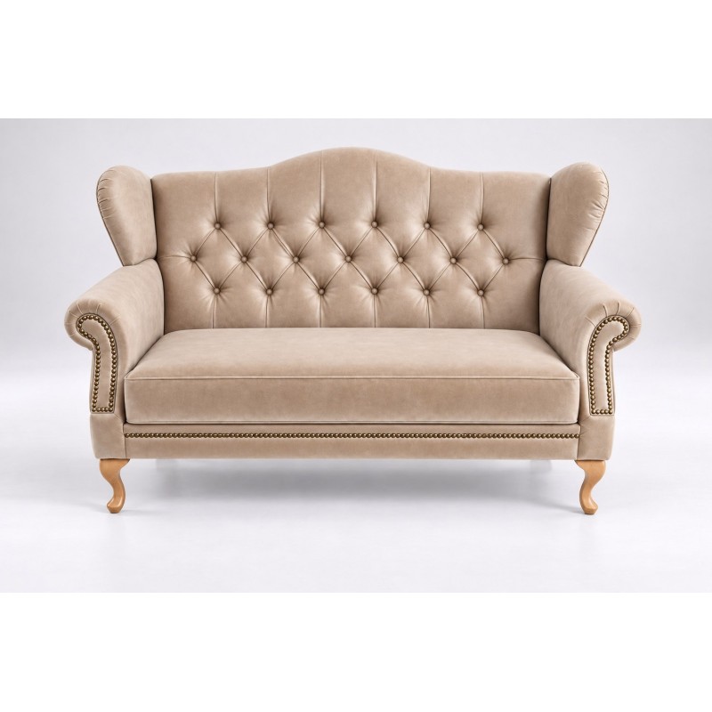 Sofa uszak z ćwiekami Aloha 150 cm w beżowej skórze, widok od frontu Sofa uszak z ćwiekami Aloha 150 cm w beżowej skórze, widok od frontu