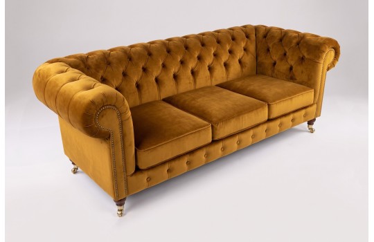 Musztardowa welurowa kanapa chesterfield Elpida 220 cm Musztardowa welurowa kanapa chesterfield Elpida 220 cm