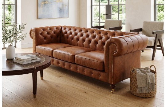 Kanapa chesterfield na kółkach Elpida 220 cm w koniakowej skórze naturalnej