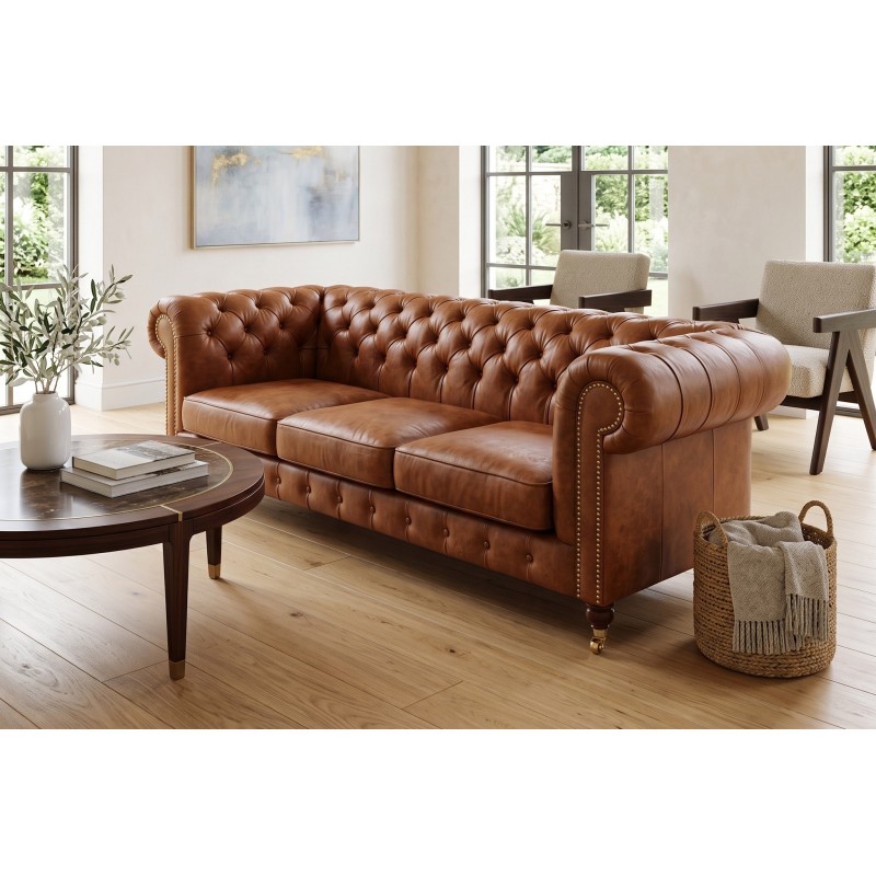 Kanapa chesterfield na kółkach Elpida 220 cm w koniakowej skórze naturalnej Kanapa chesterfield na kółkach Elpida 220 cm w koniakowej skórze naturalnej