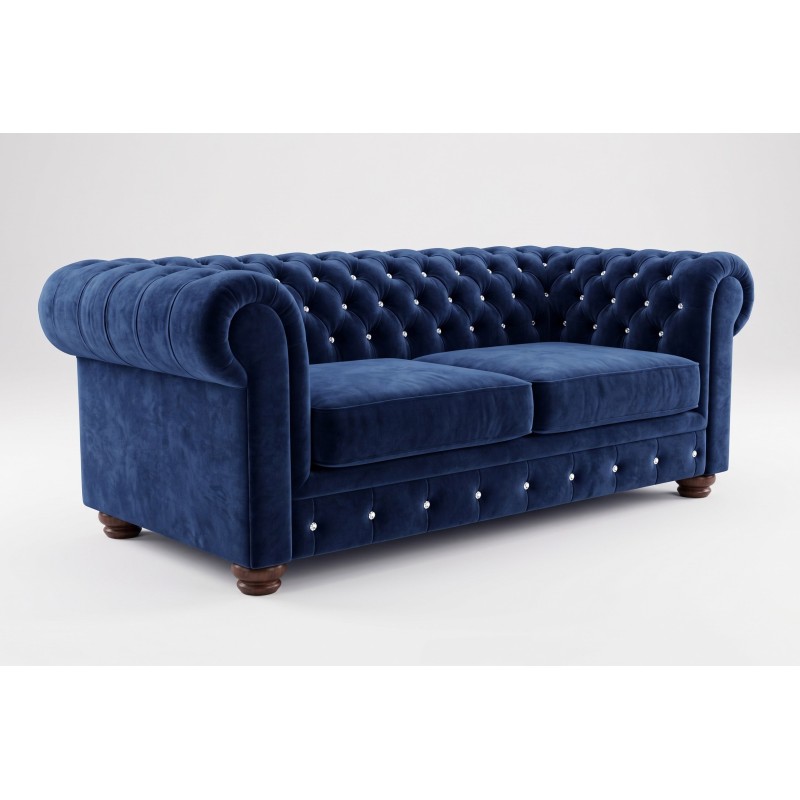 Granatowa sofa chesterfield w welurze – pikowanie zdobione cyrkoniami i toczone nóżki Granatowa sofa chesterfield w welurze – pikowanie zdobione cyrkoniami i toczone nóżki