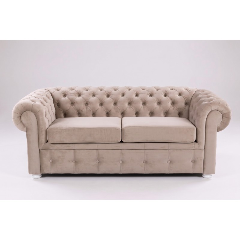 Beżowa sofa Chesterfield Retro na jasnym tle Beżowa sofa Chesterfield Retro na jasnym tle