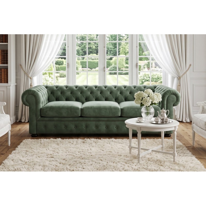 Zielona sofa Chesterfield Retro w salonie z dużymi oknami Zielona sofa Chesterfield Retro w salonie z dużymi oknami