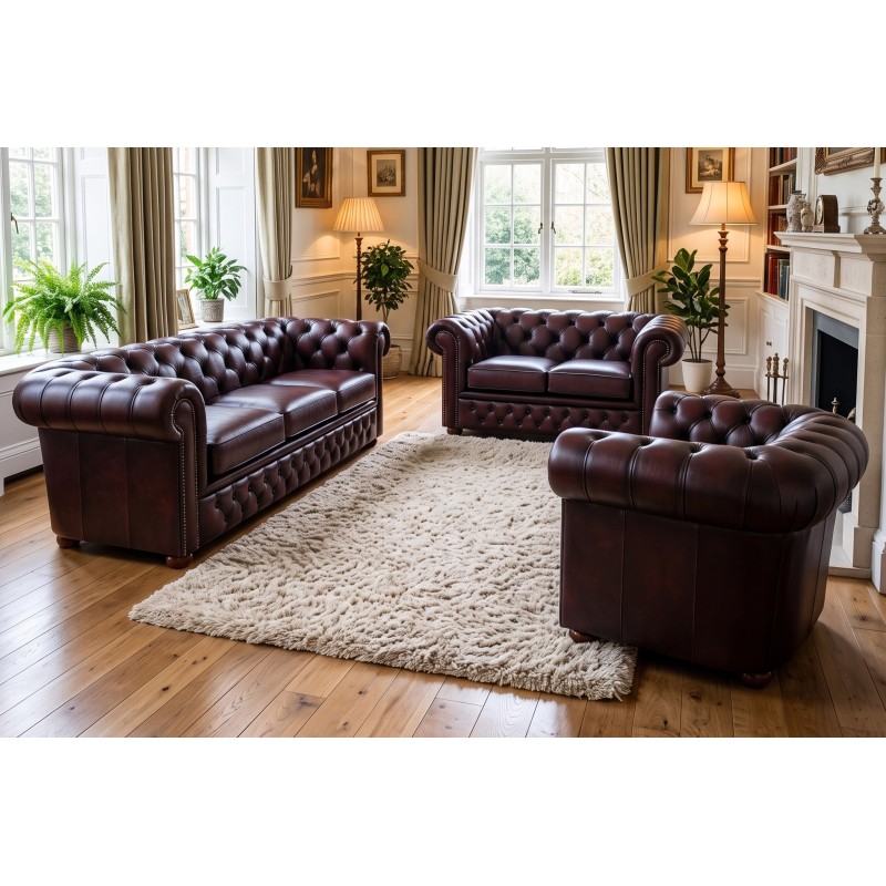 Komplet chesterfield Foster w bordowej skórze – sofa z fotelem w klasycznym salonie