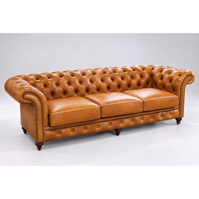 Sofa chesterfield Harry na wymiar – koniakowa skóra, trzy siedziska i toczone nóżki