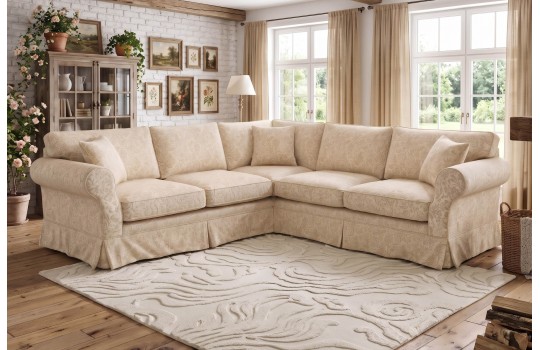 Narożnik z falbaną Wenecja w kremowej tkaninie w salonie z ceglaną ścianą