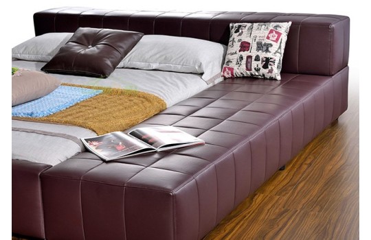 Tapicerowane łóżko kostka 