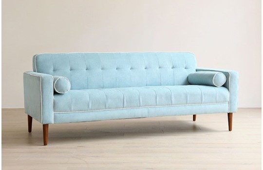 Niebieska sofa w stylu skandynawskim Lian