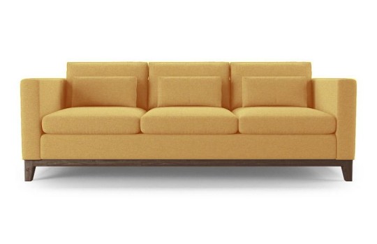 Żółta sofa z drewnianą podstawą Panama